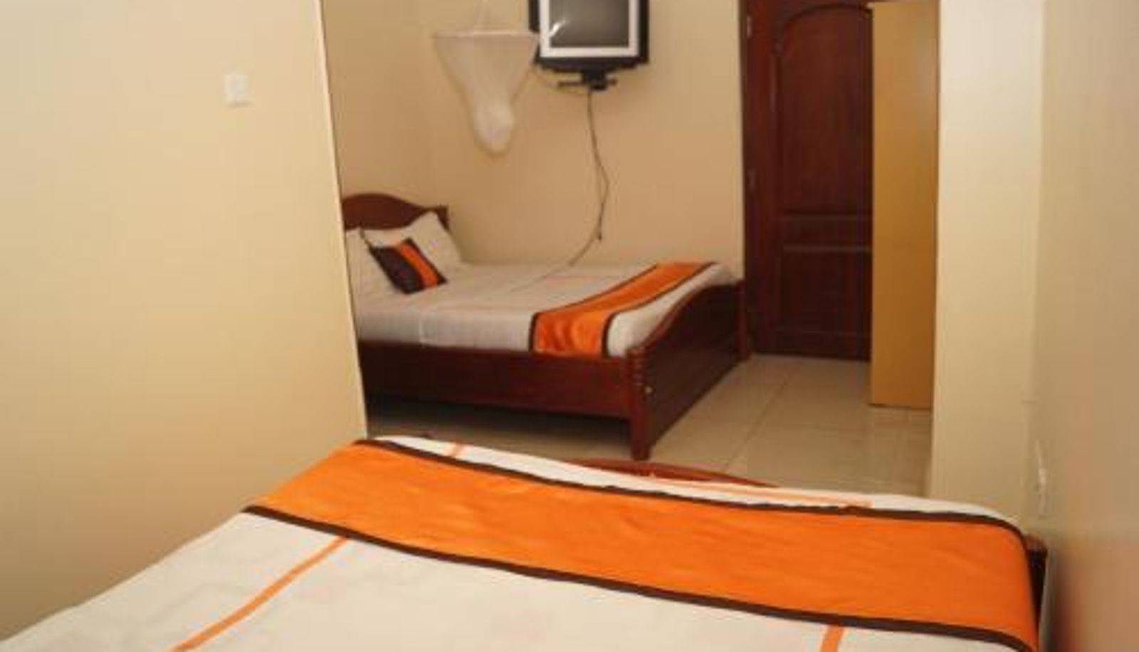 Kamer - KK Trust Hotel Kampala