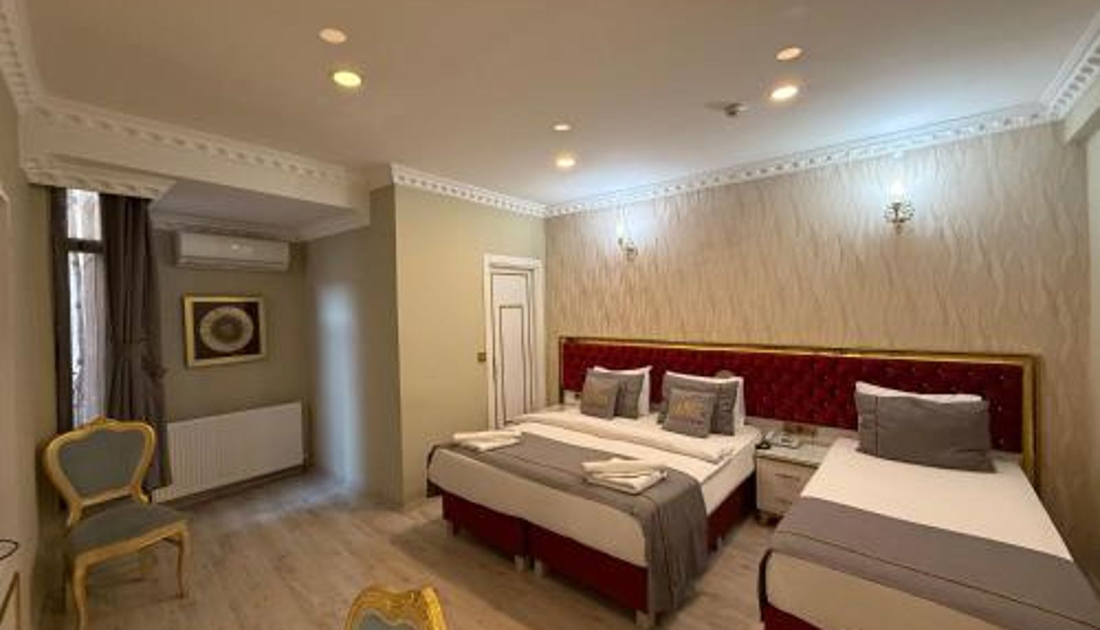 Habitación triple - RHYTHM HOTEL
