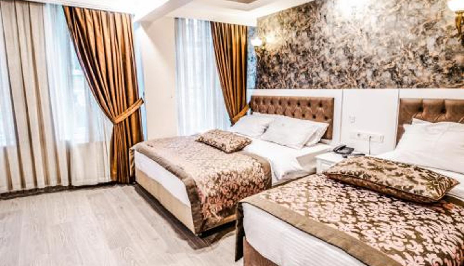 Dreibettzimmer - Lazz City Hotel