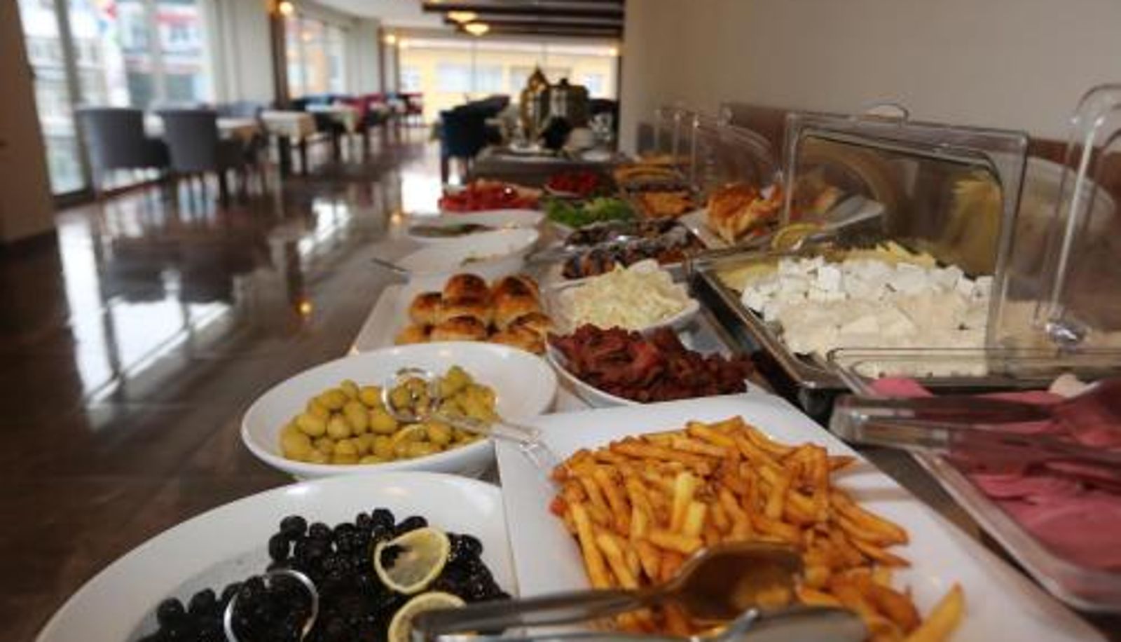 Sala de desayunos dentro del restaurante - TEVETOGLU HOTEL