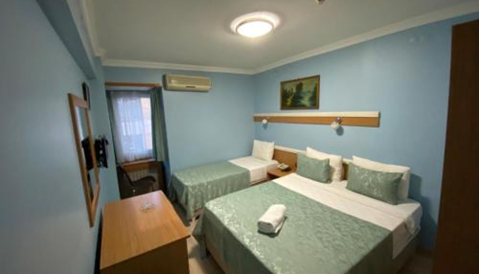 Habitación triple - Hotel Oz Villa
