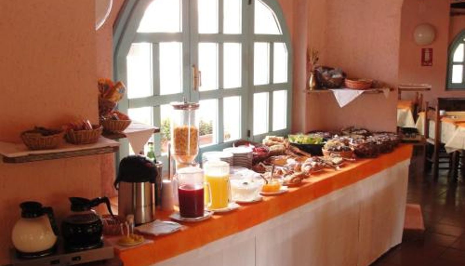 Frühstücksraum innerhalb des Restaurants - Hotel Scintilla