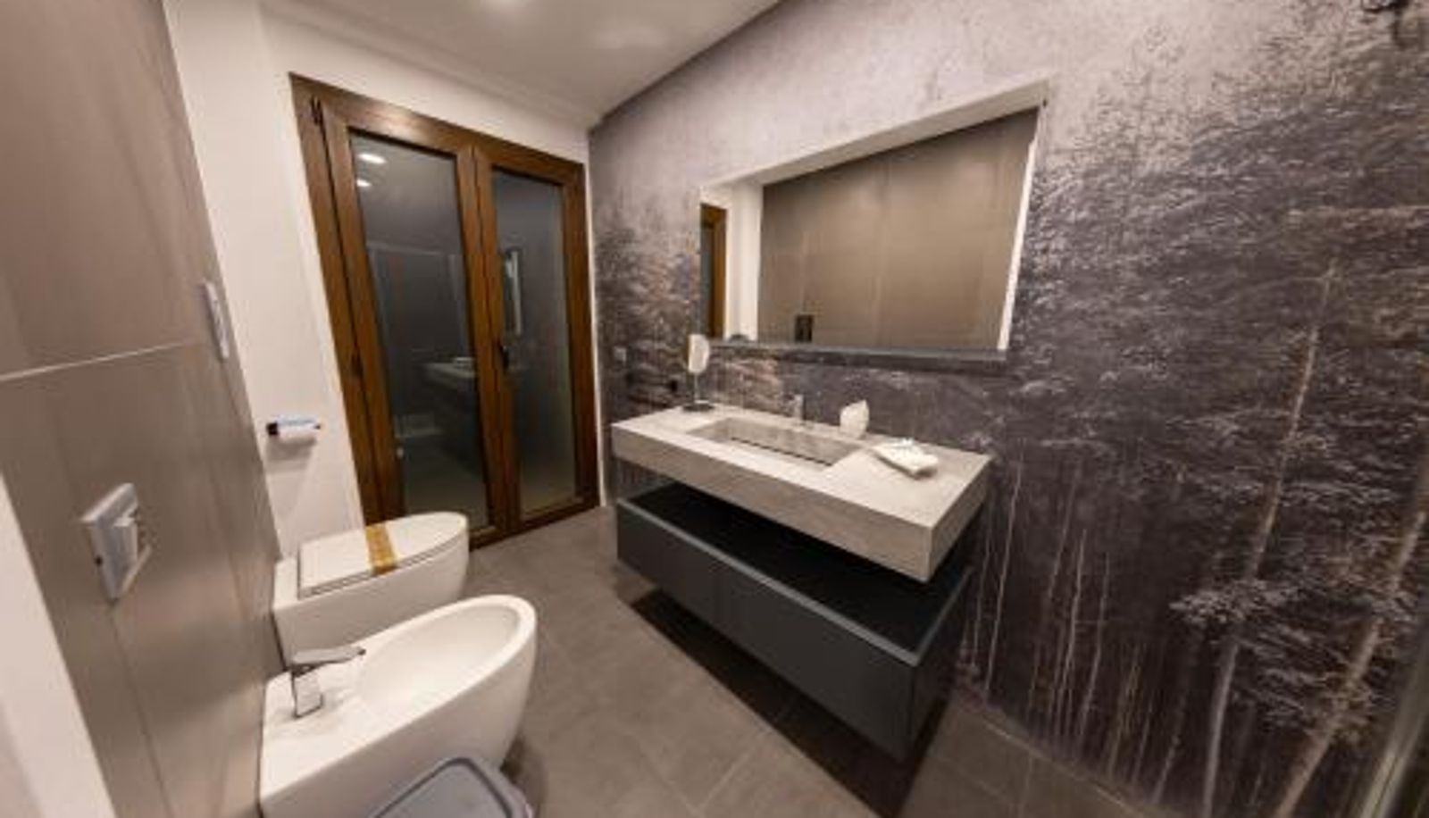 Badezimmer - River Hotel