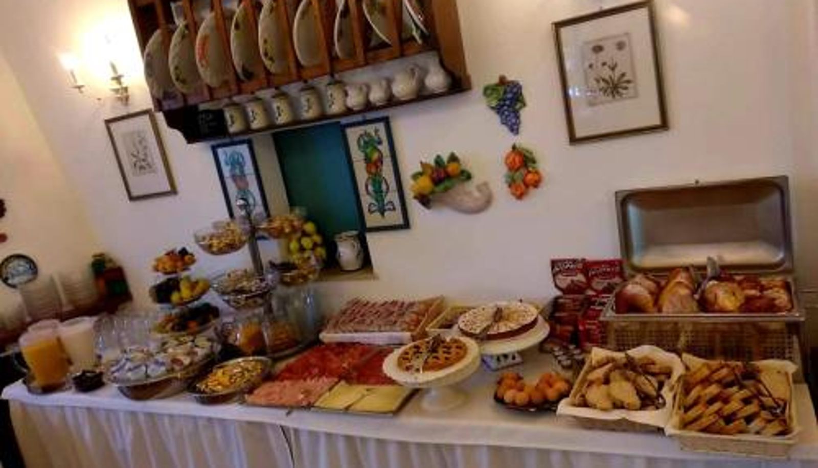 Salle de petit-déjeuner dans le restaurant - Hotel La Primula
