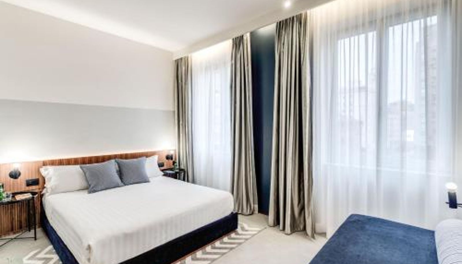 Dreibettzimmer - Sospeso Boutique Hotel