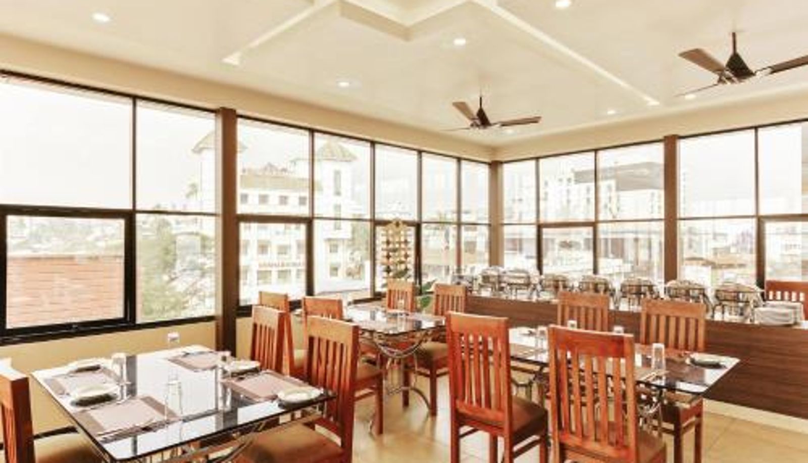 Breakfast room within the restaurant - Treebo Goodland Residency - 500m Railway Station
