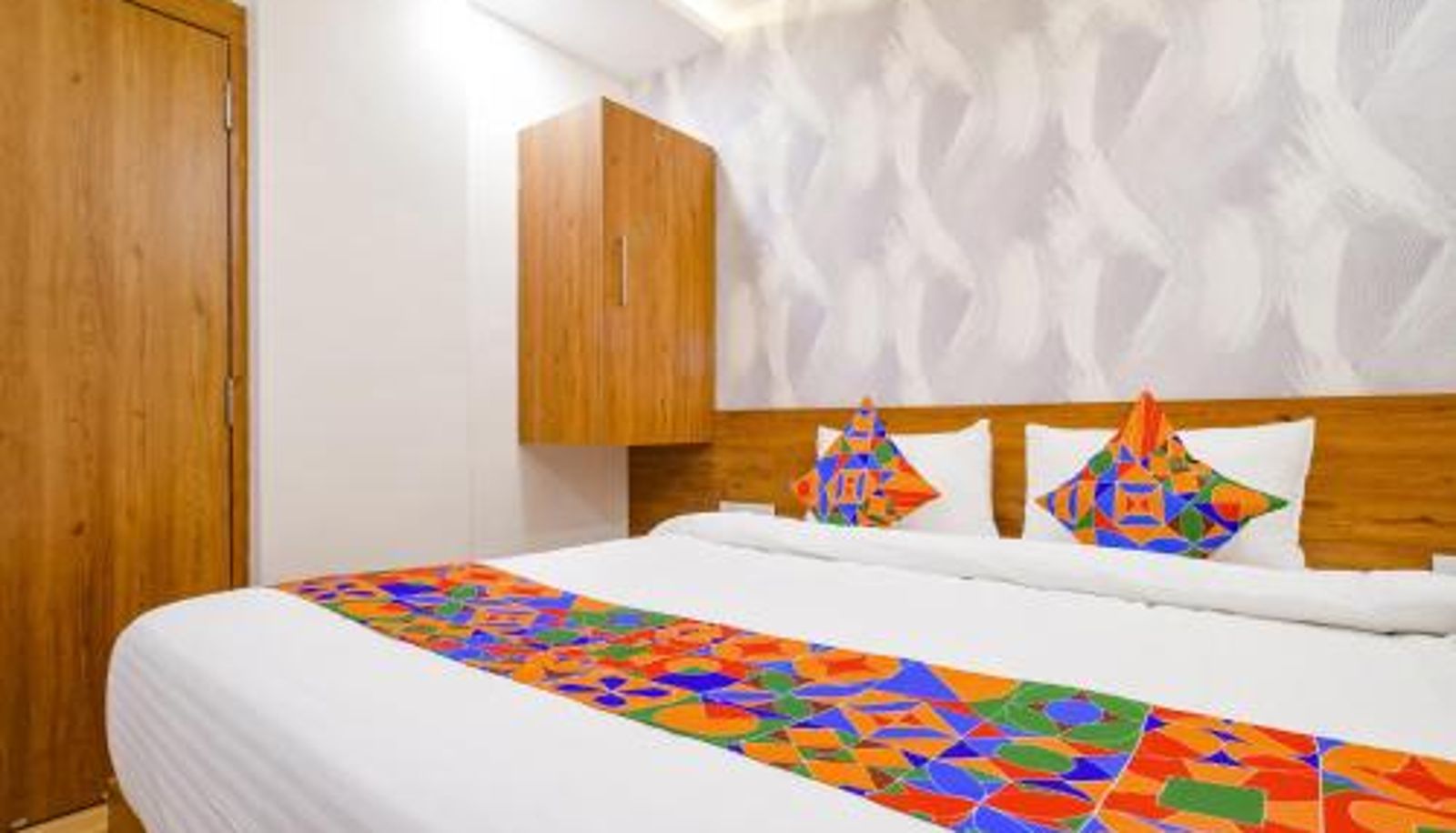 Info - FabHotel Woodlark Inn