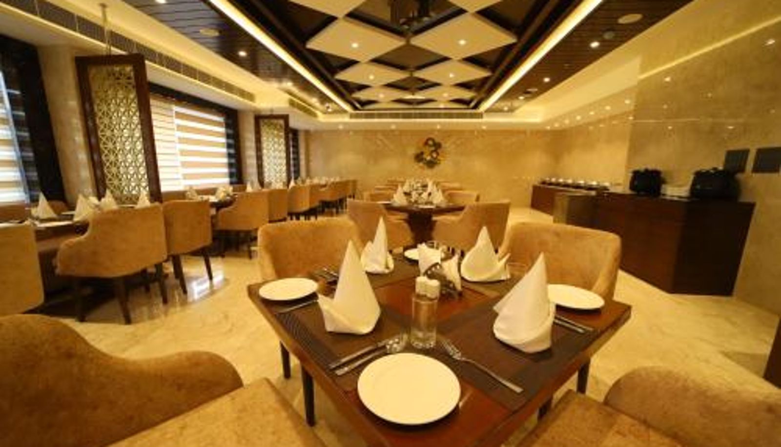 Breakfast room within the restaurant - Hotel DVIJ INN