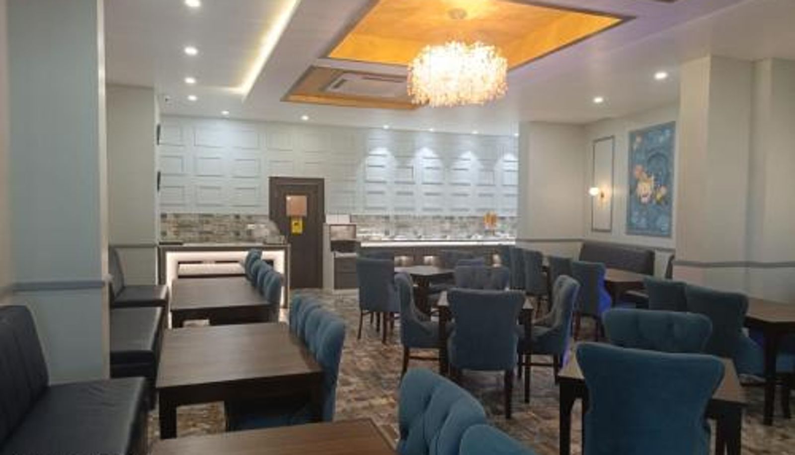 Sala de desayunos dentro del restaurante - Tulip Tree Hotel