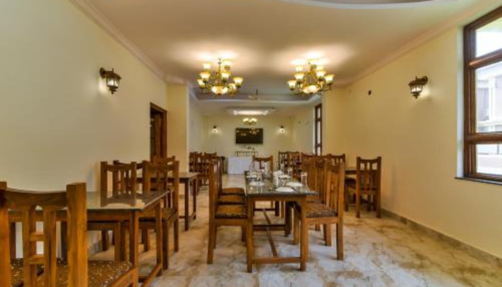Salle de petit-déjeuner dans le restaurant - Sonikas Holiday Homes (Studio)