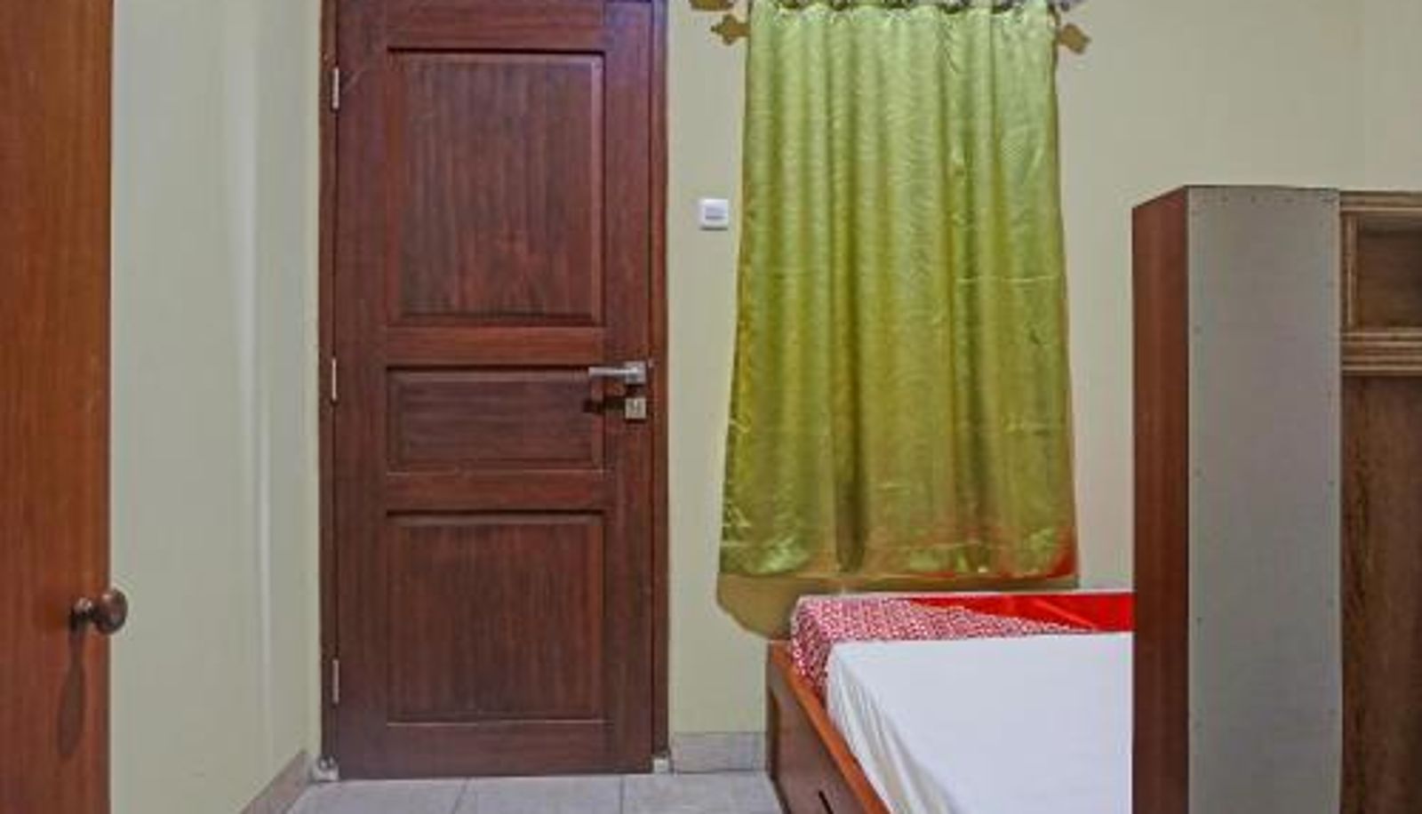 Room - Hotel O Orange Homestay Makassar