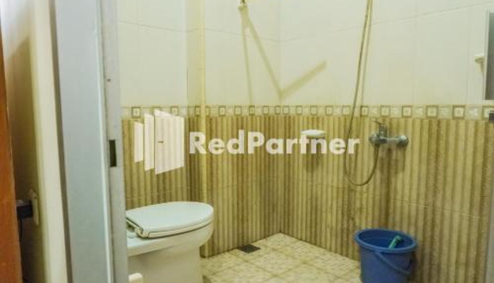 Standardzimmer - Grand Kembar Hotel Mitra RedDoorz