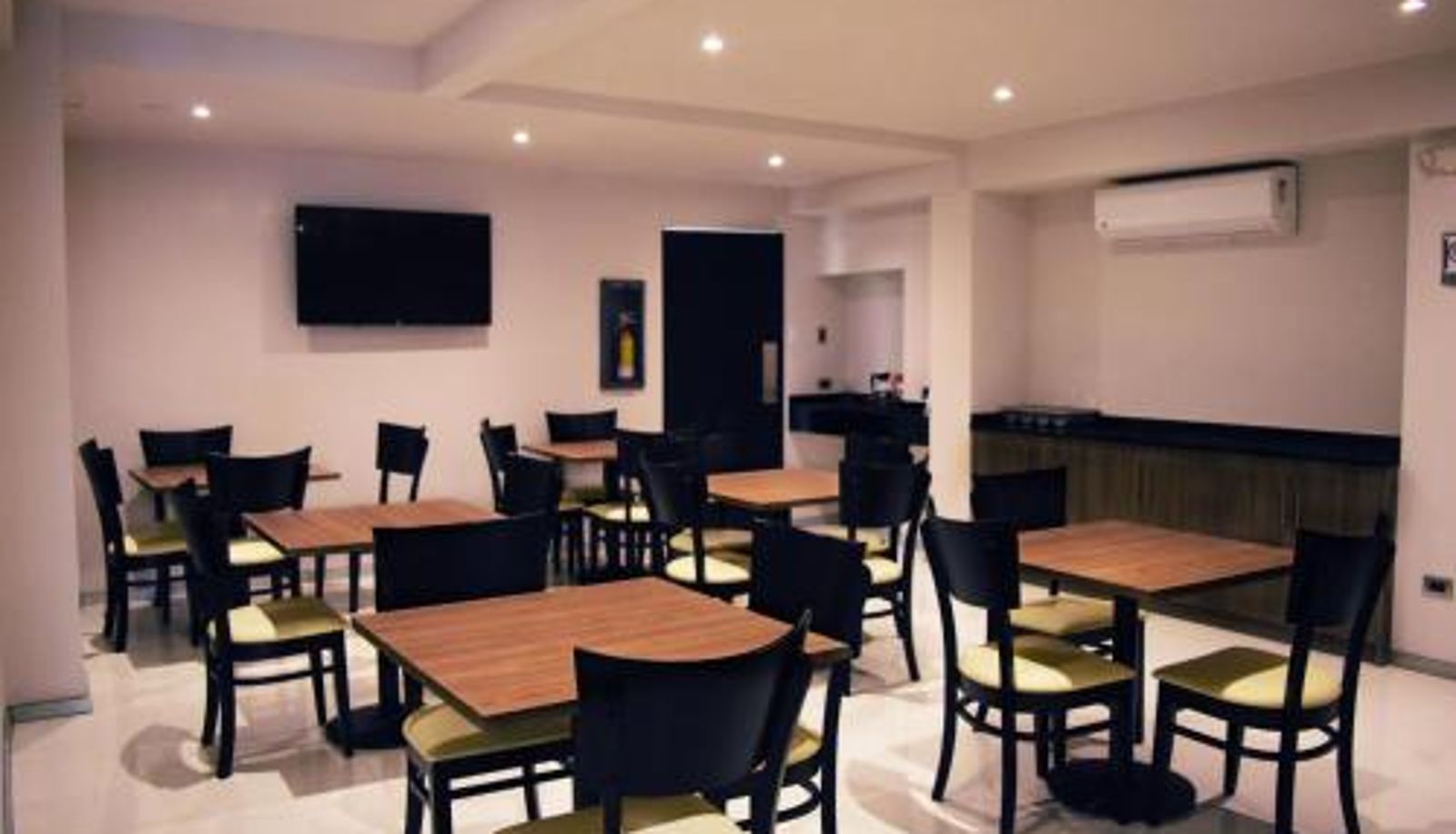 Ontbijtzaal in het restaurant - Hotel Olé