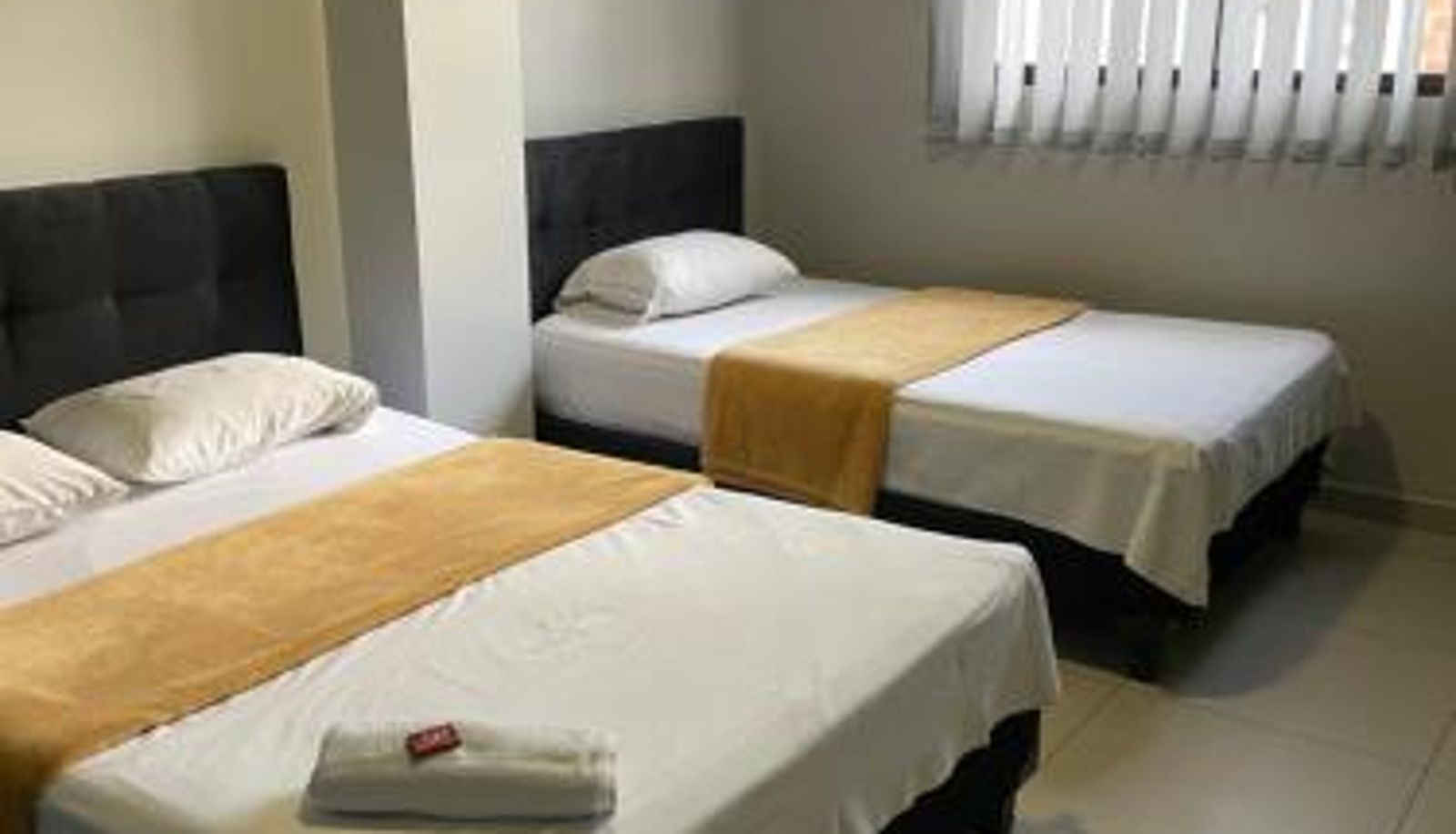Triple room - Hotel Escorial Ibagué