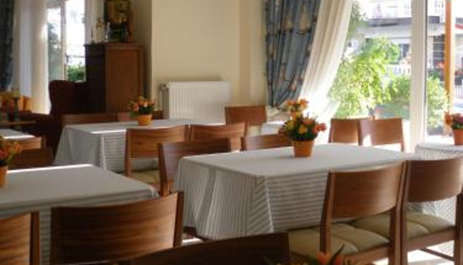 Ontbijtzaal in het restaurant - Hotel Naias