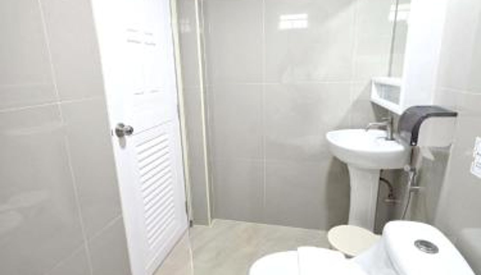 Cuarto de baño - PT Grand Hotel