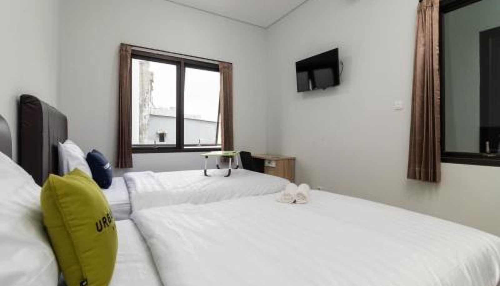 Zimmer - Urbanview Hotel Pasar Baru Jakarta by RedDoorz