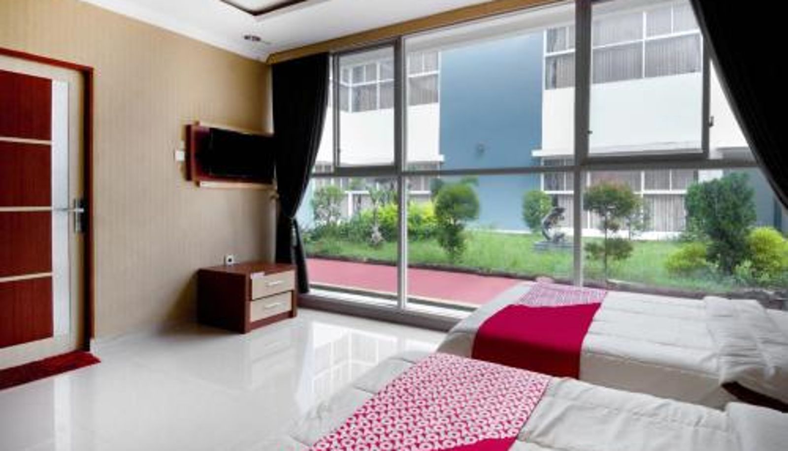 Kamer - Collection O 3431 Hotel Alpha Bandara