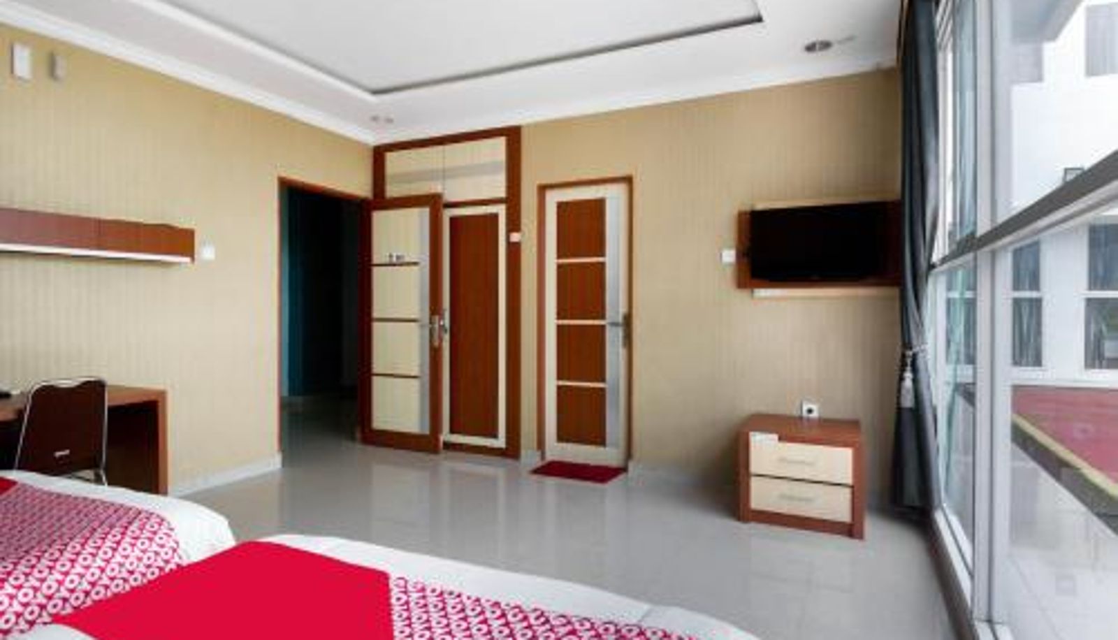 Kamer - Collection O 3431 Hotel Alpha Bandara