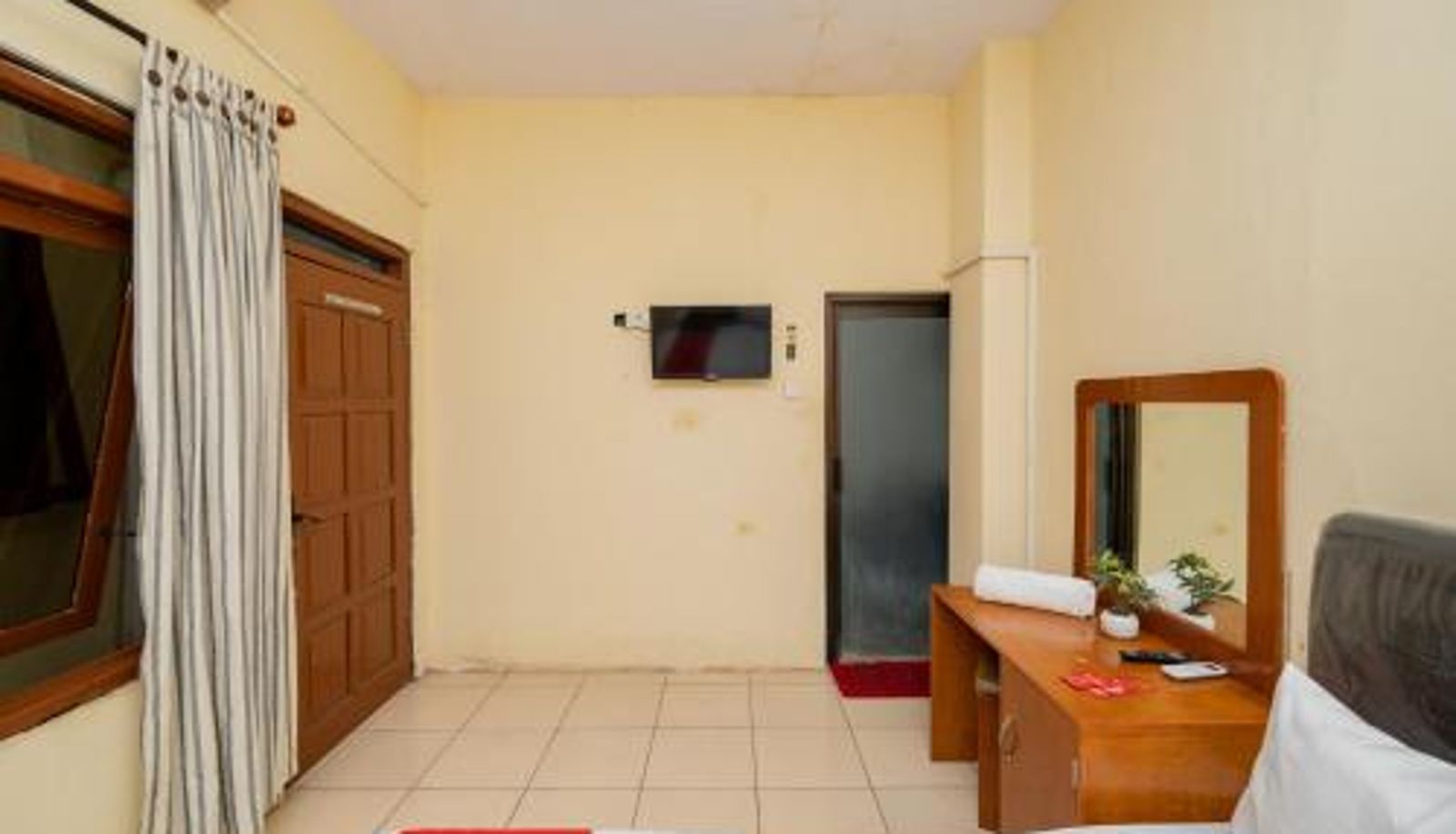 Habitación familiar - RedDoorz Syariah At Danau Maninjau Sawojajar