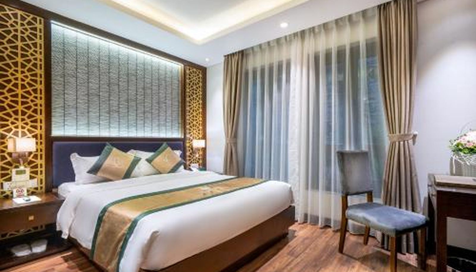 Room - Conifer Grand Hotel