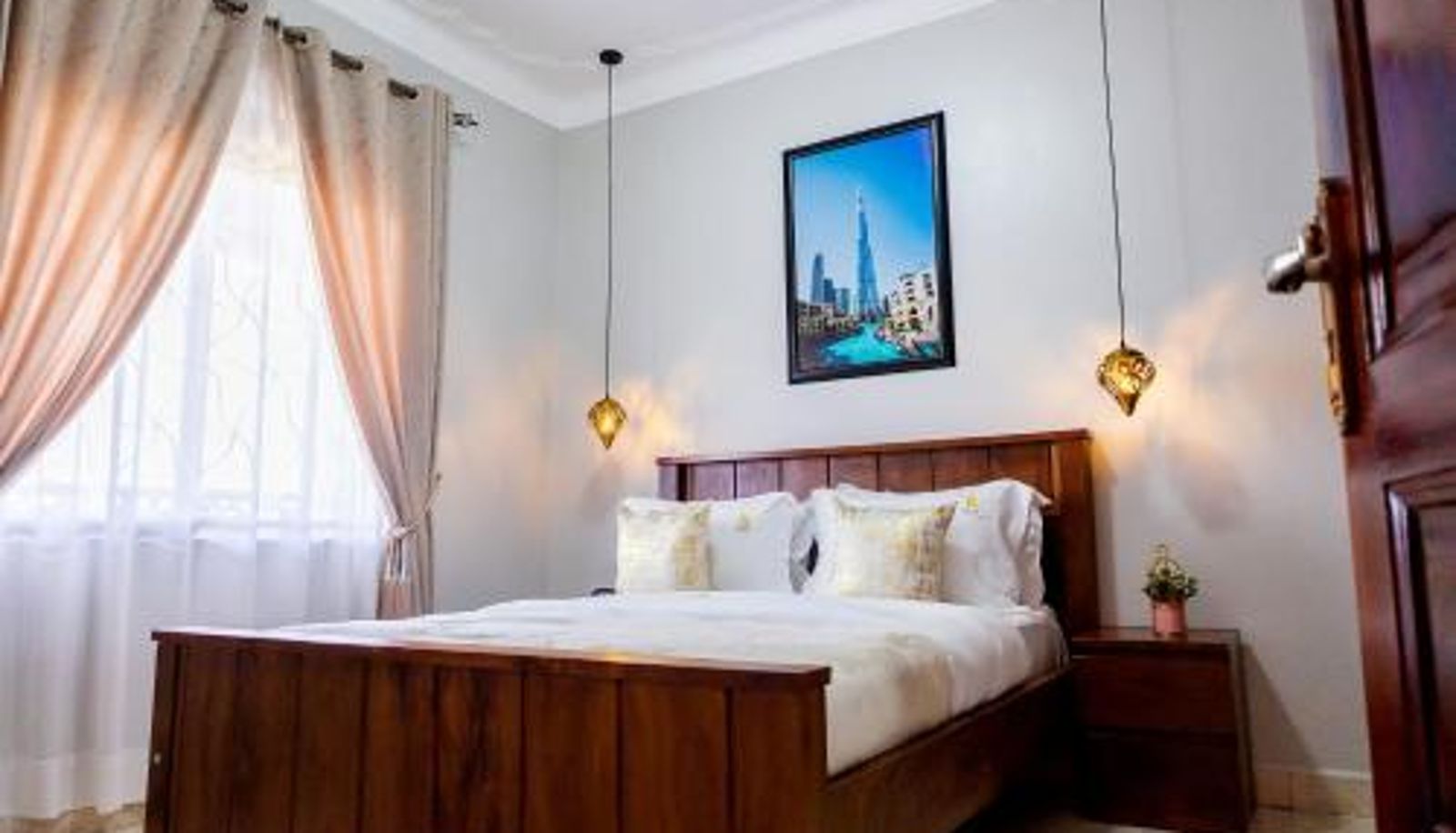 Habitación - Premier Suites Kyanja