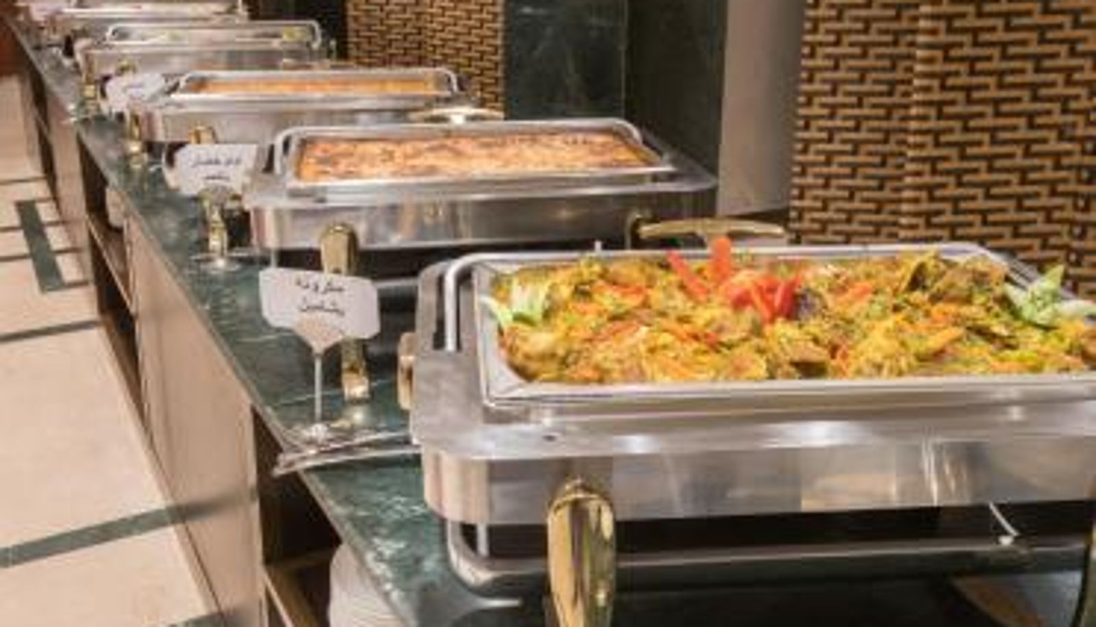 Sala de desayunos dentro del restaurante - Etlalat Alhadiqa Suites