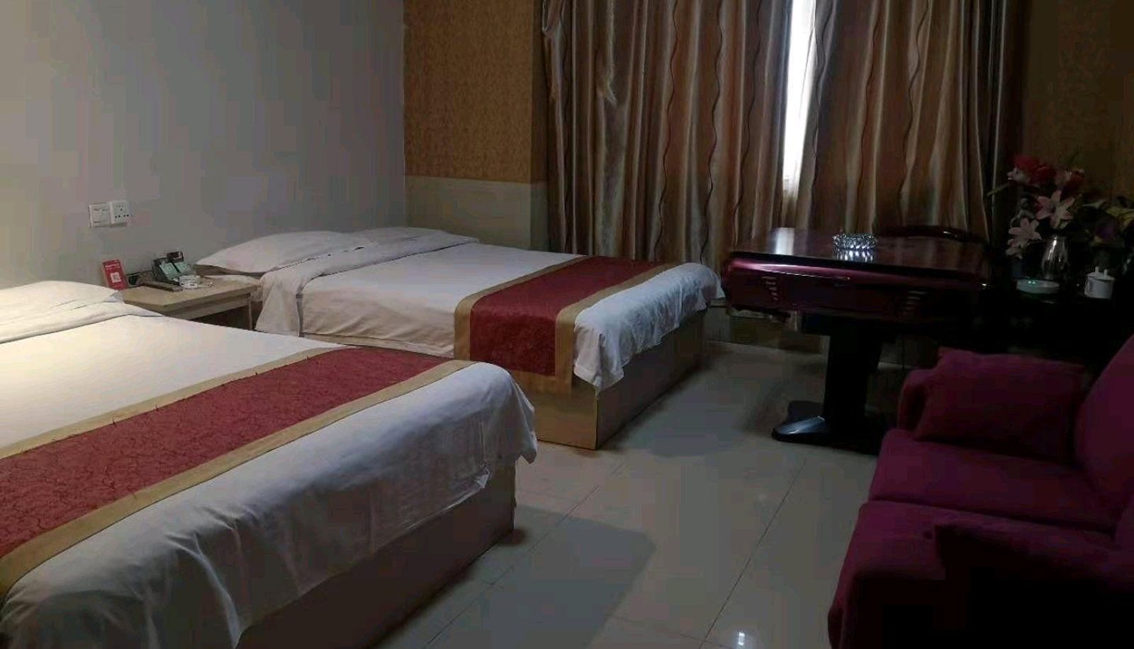 Zimmer - Guoxianglou Business Hotel