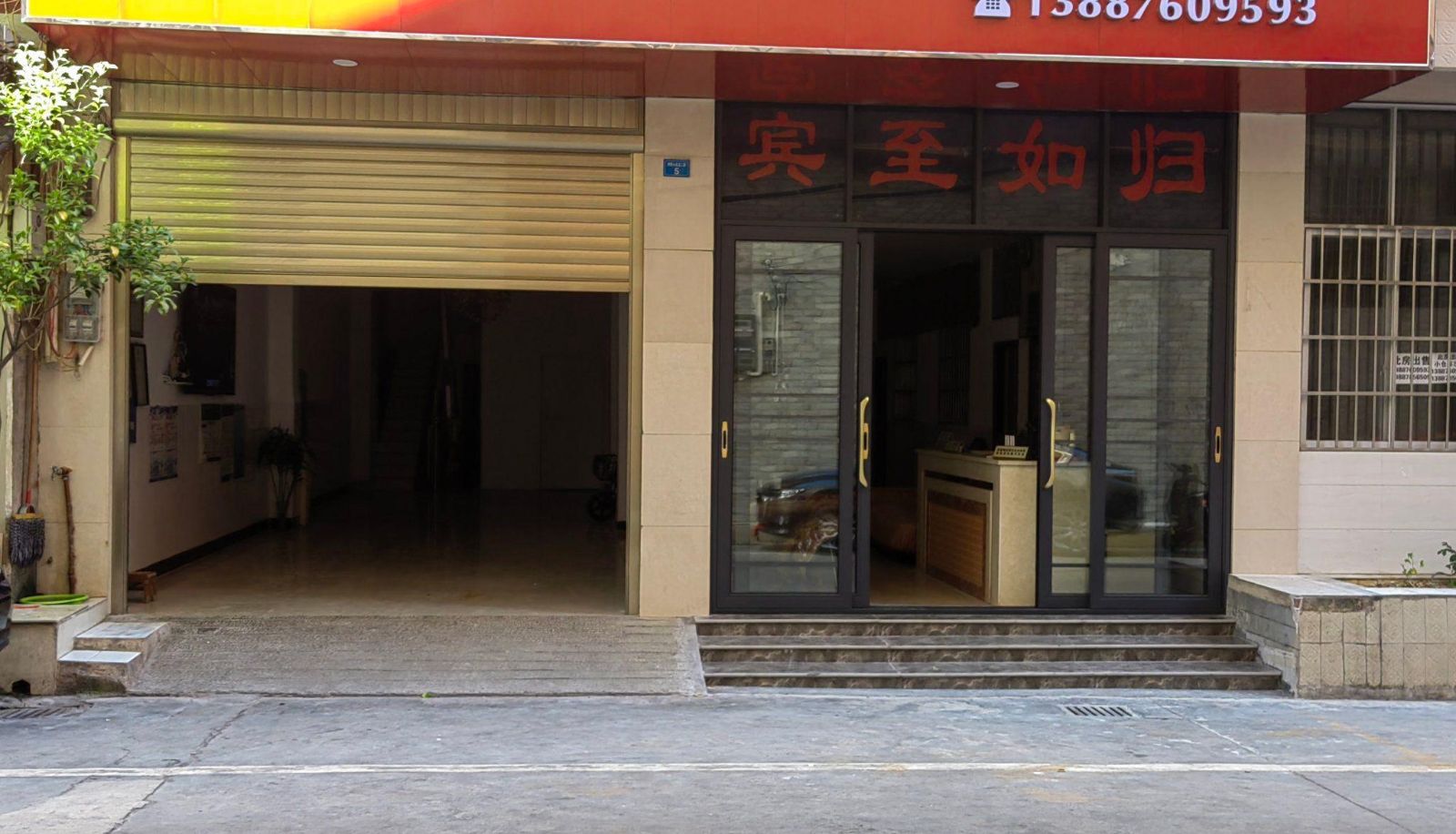 Buitenruimte van het hotel - Xinghualong Hotel