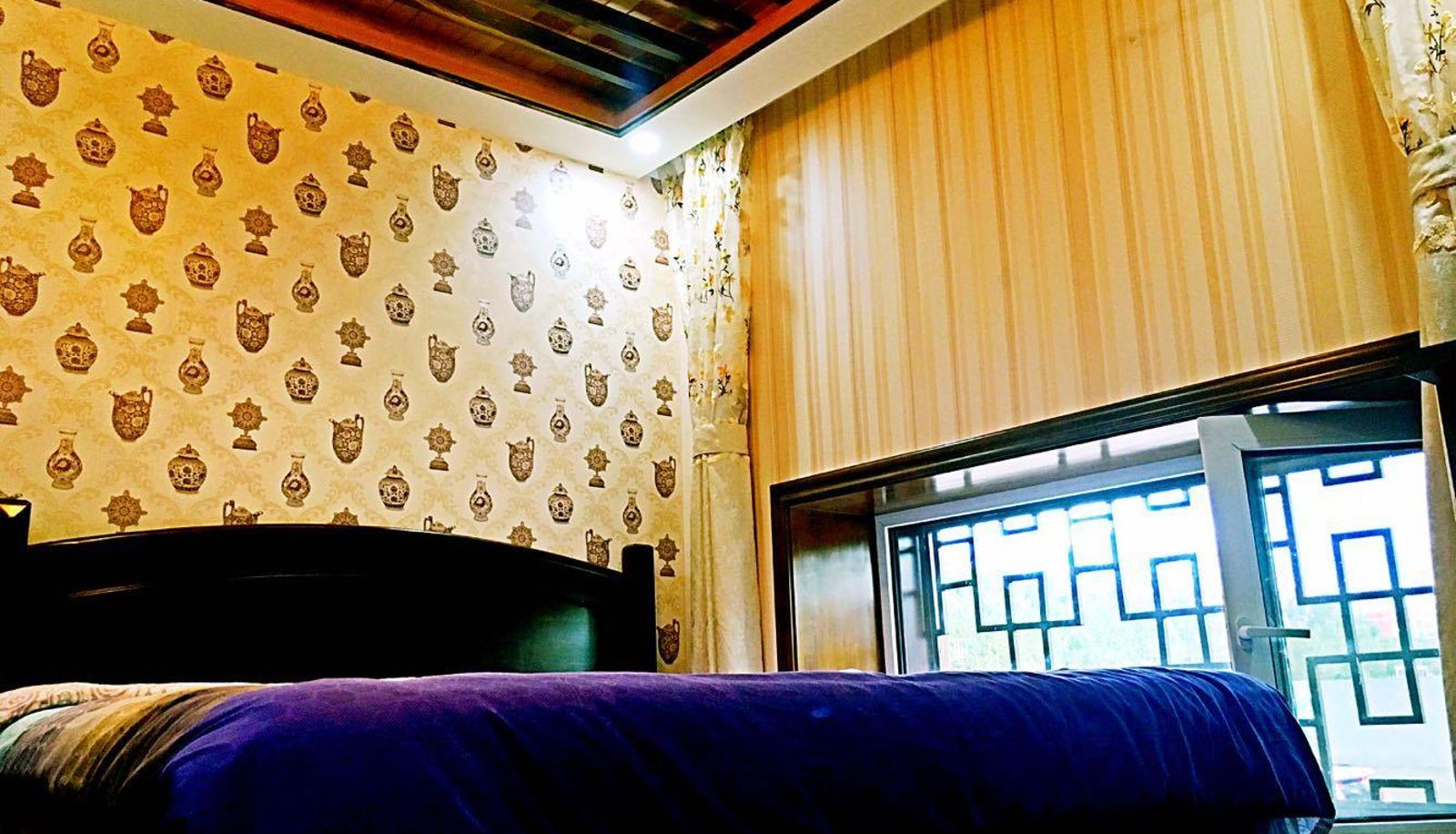 Zona exterior del hotel - Yisu Guest House
