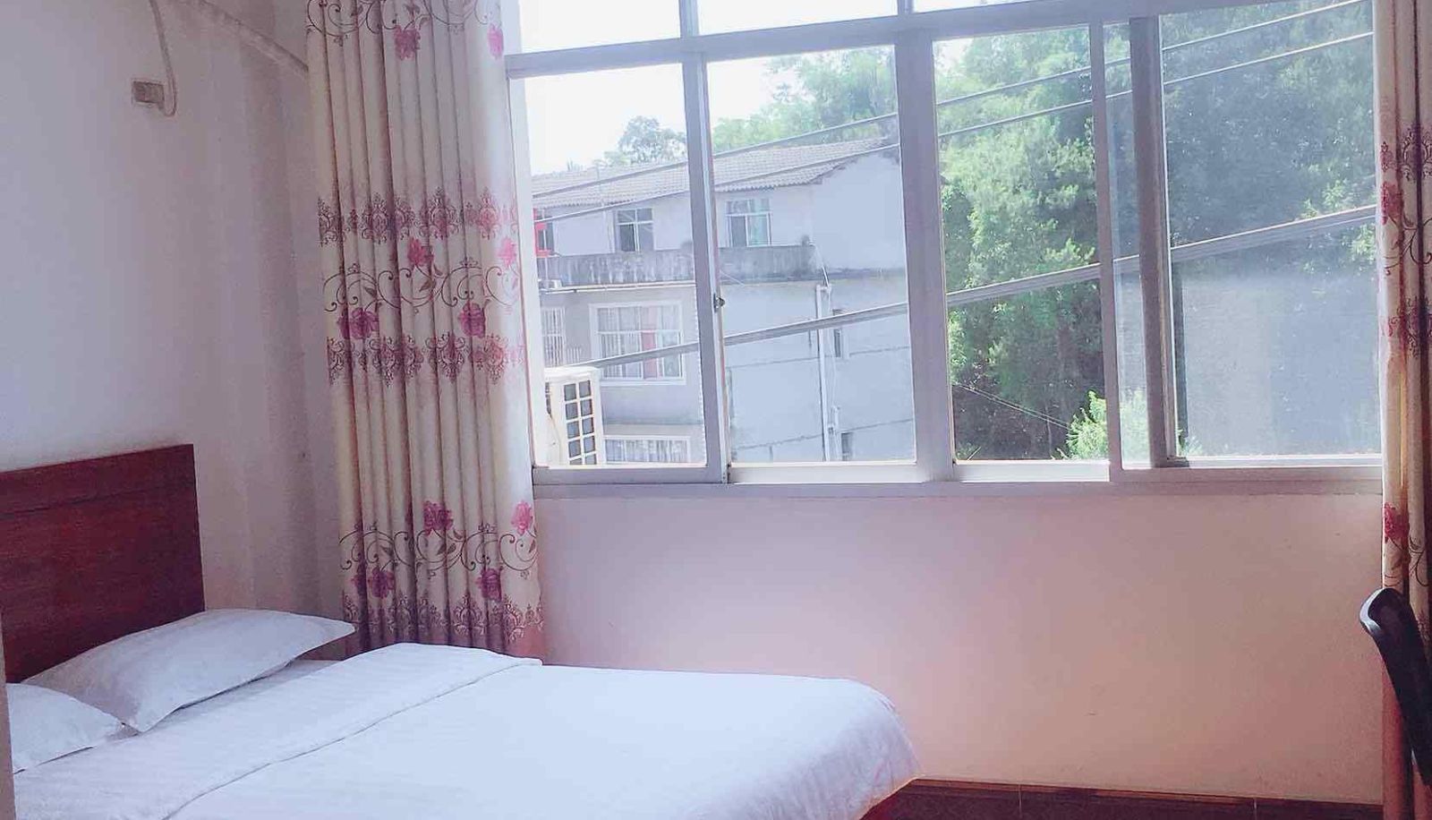 Chambre - New Era Accommodation