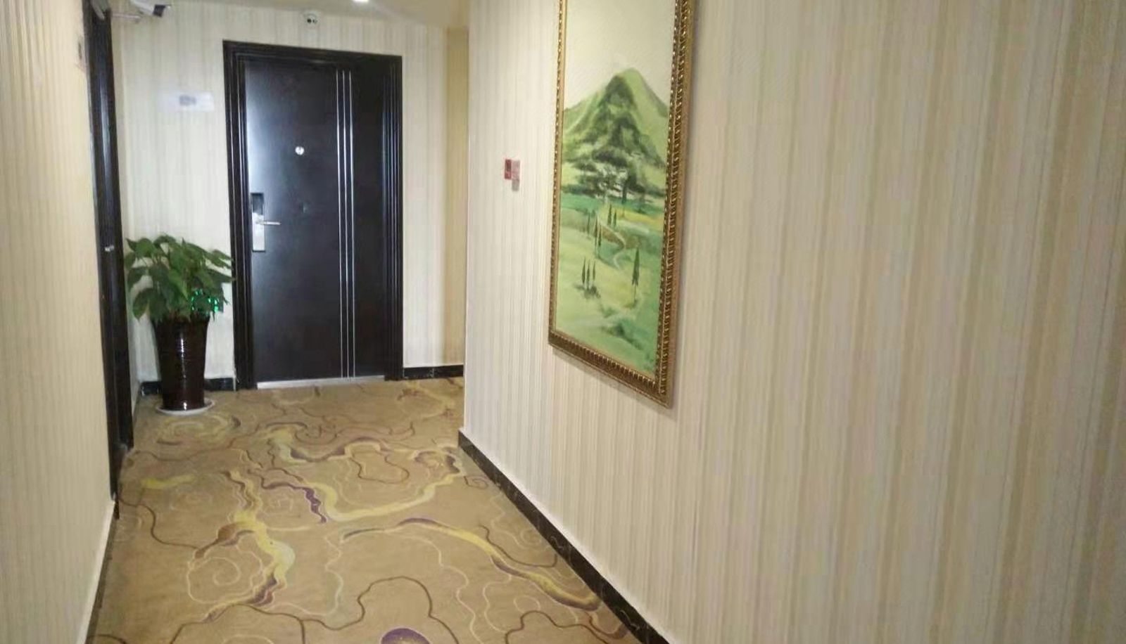 Zona exterior del hotel - Mengji Hotel (Wanda Plaza Store)