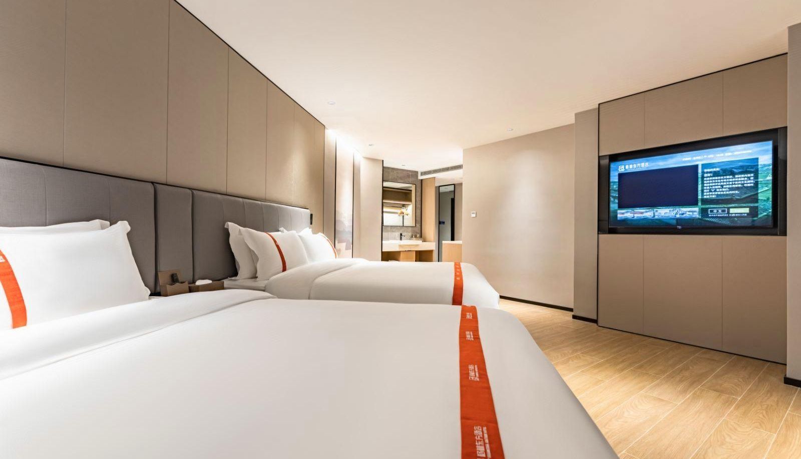 Habitación familiar - Green Oriental Hotel (Haikou High Speed Rail East Station Branch)