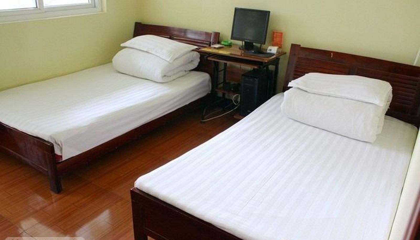 Zimmer - Qiqi Hotel