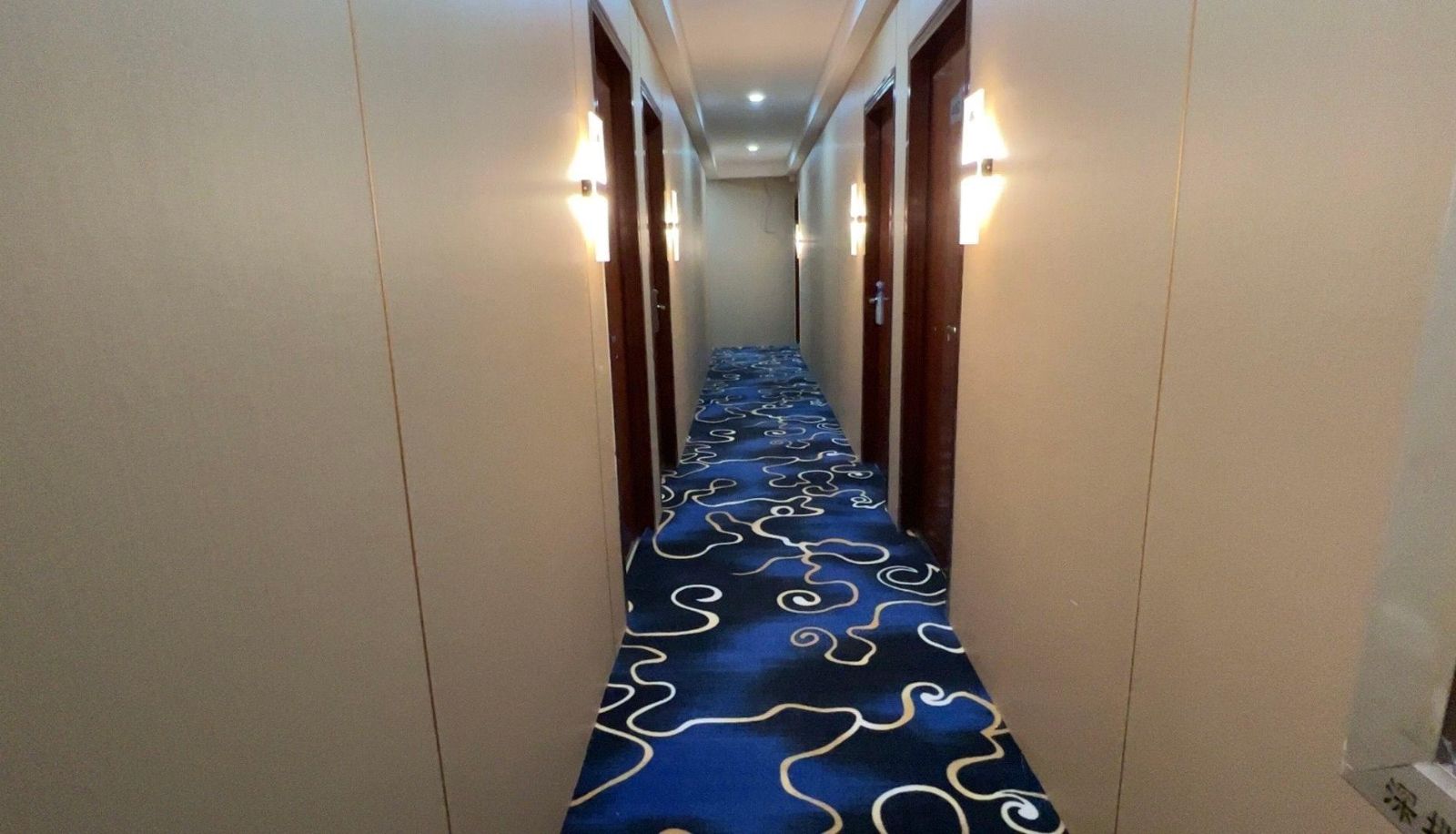 Zona exterior del hotel - Jinfeng Business Hotel