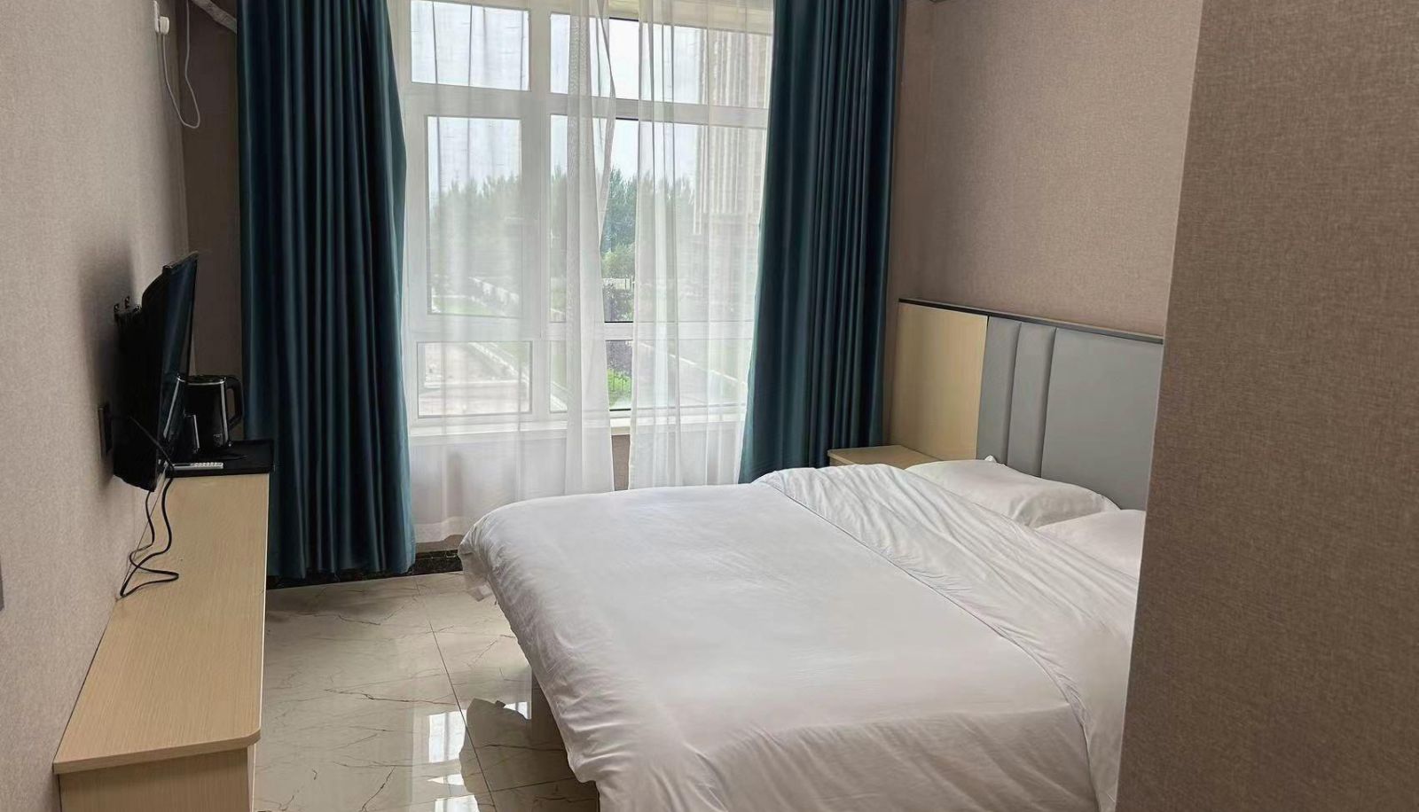 Business-Zimmer - Zhuomei Boutique Homestay (North Lake Wuyue Plaza Store)
