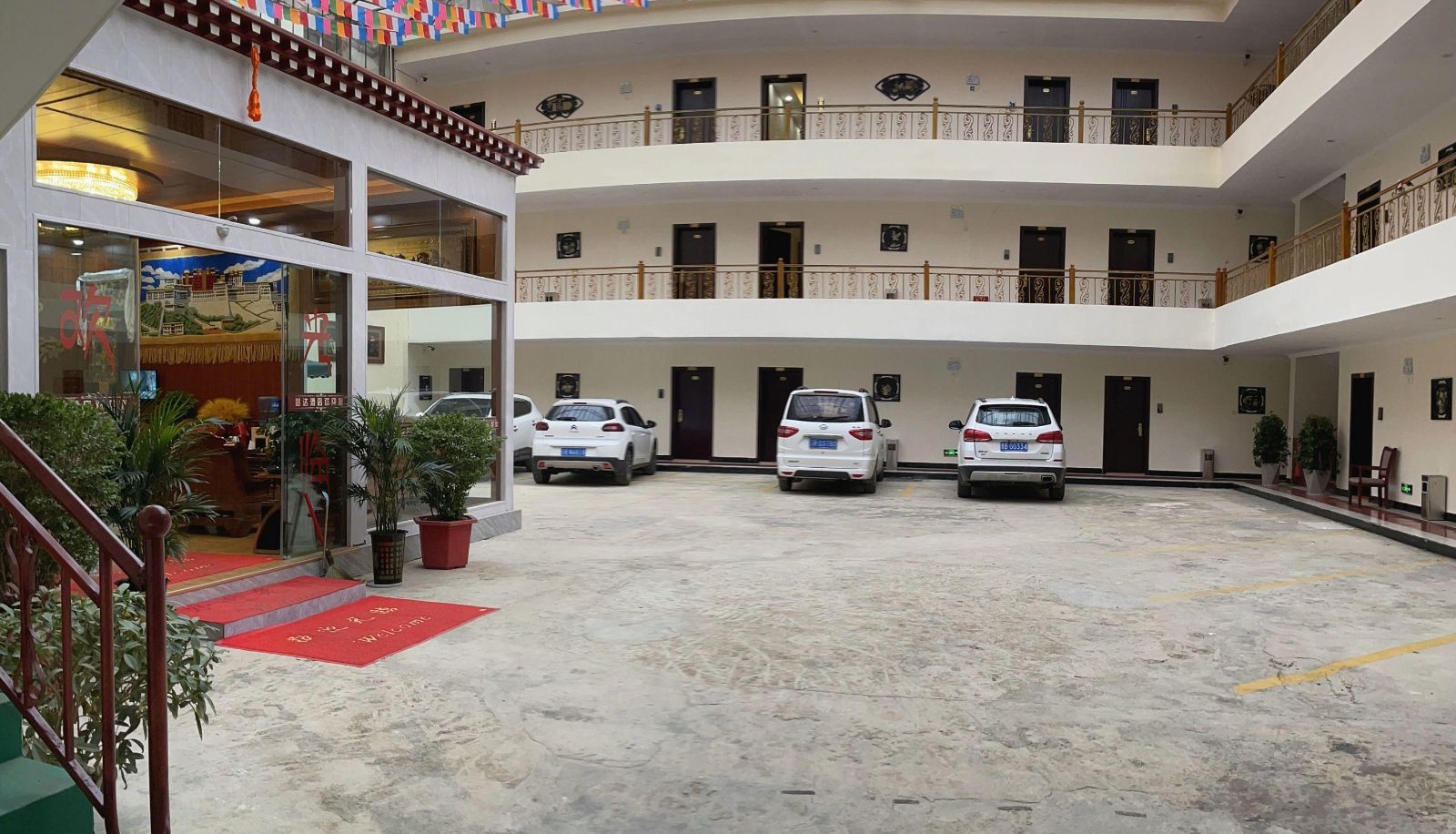 Buitenruimte van het hotel - Mengda Hotel