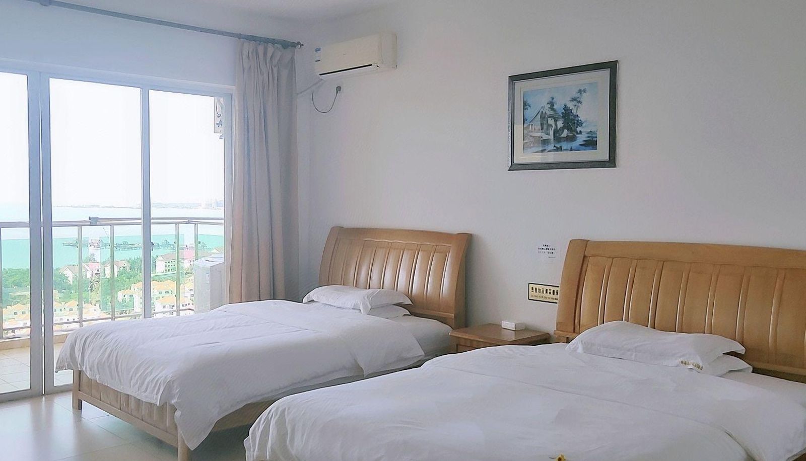 Zimmer - Coconut Sea Shangpin Holiday Hotel