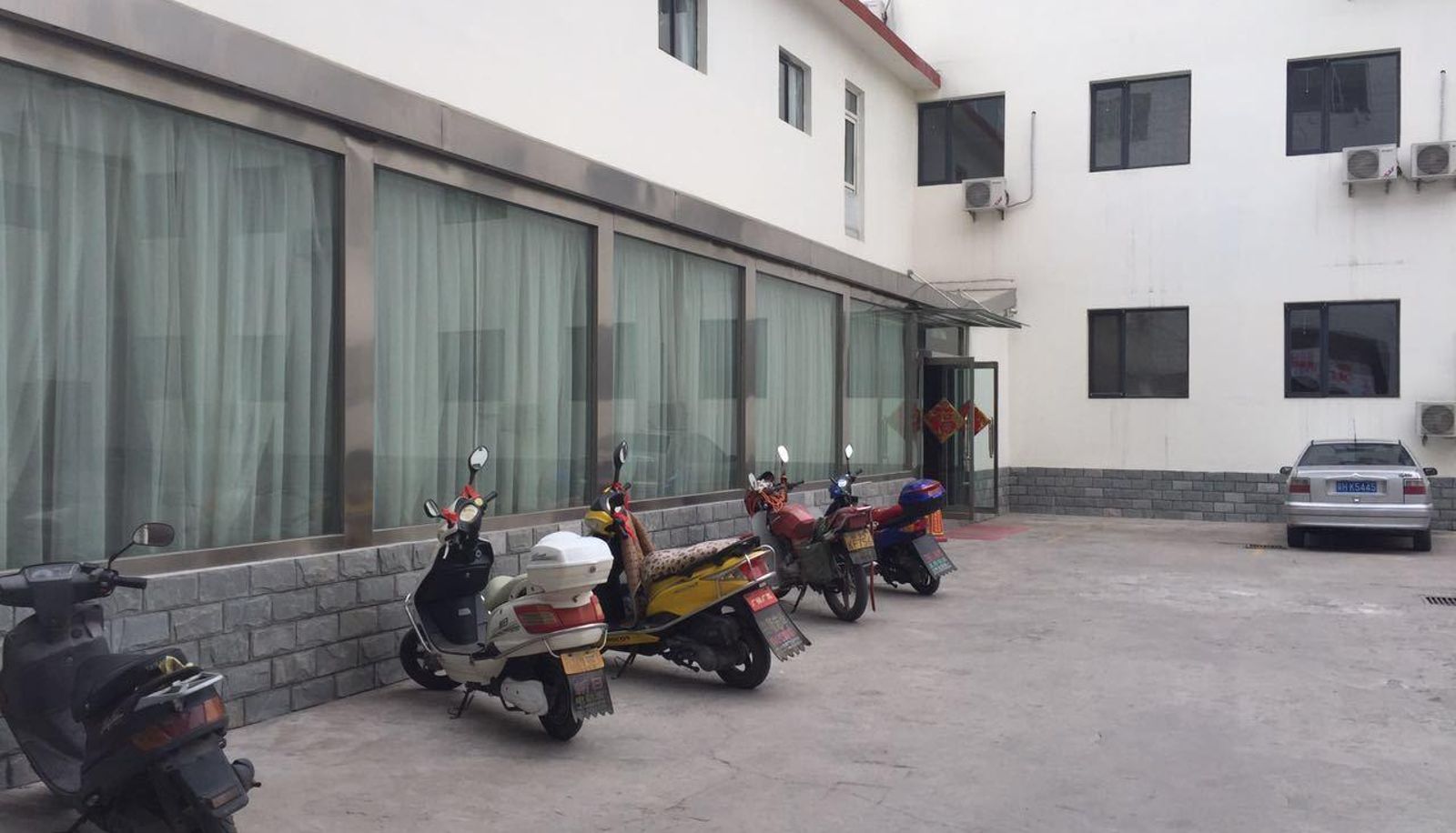 Zona exterior del hotel - Dingheng Hotel