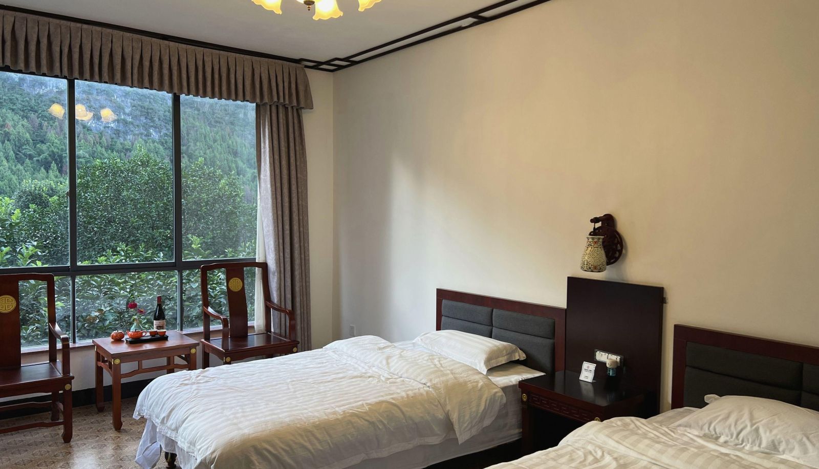 Zimmer mit Bergblick - Langzi Boutique Hotel (20 RMB Scenic Area Store)