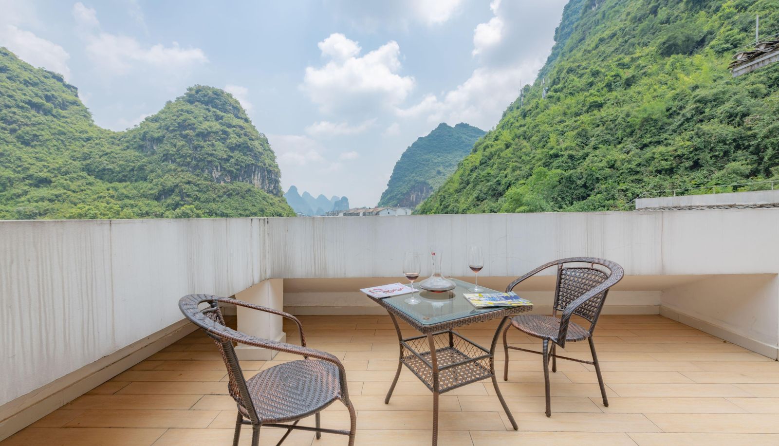 Kamer met balkon - Mu Tong Holiday Hotel (Yangshuo Impression Liu Sanjie Store)