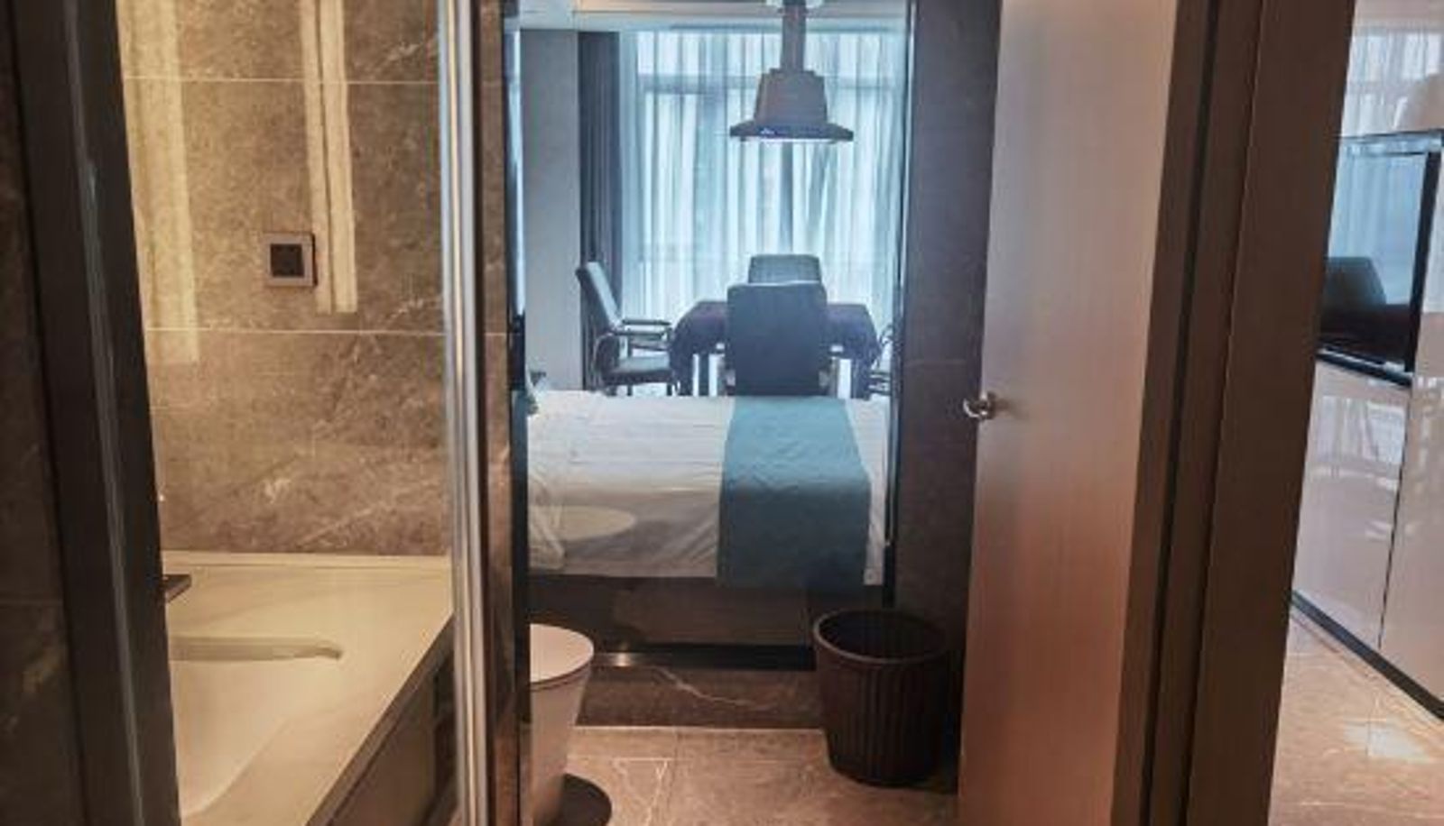 Habitación - New Beacon International Hotel