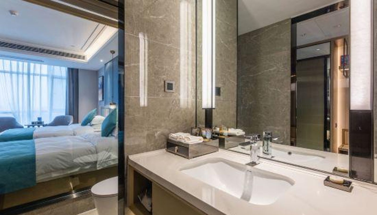 Habitación - New Beacon International Hotel