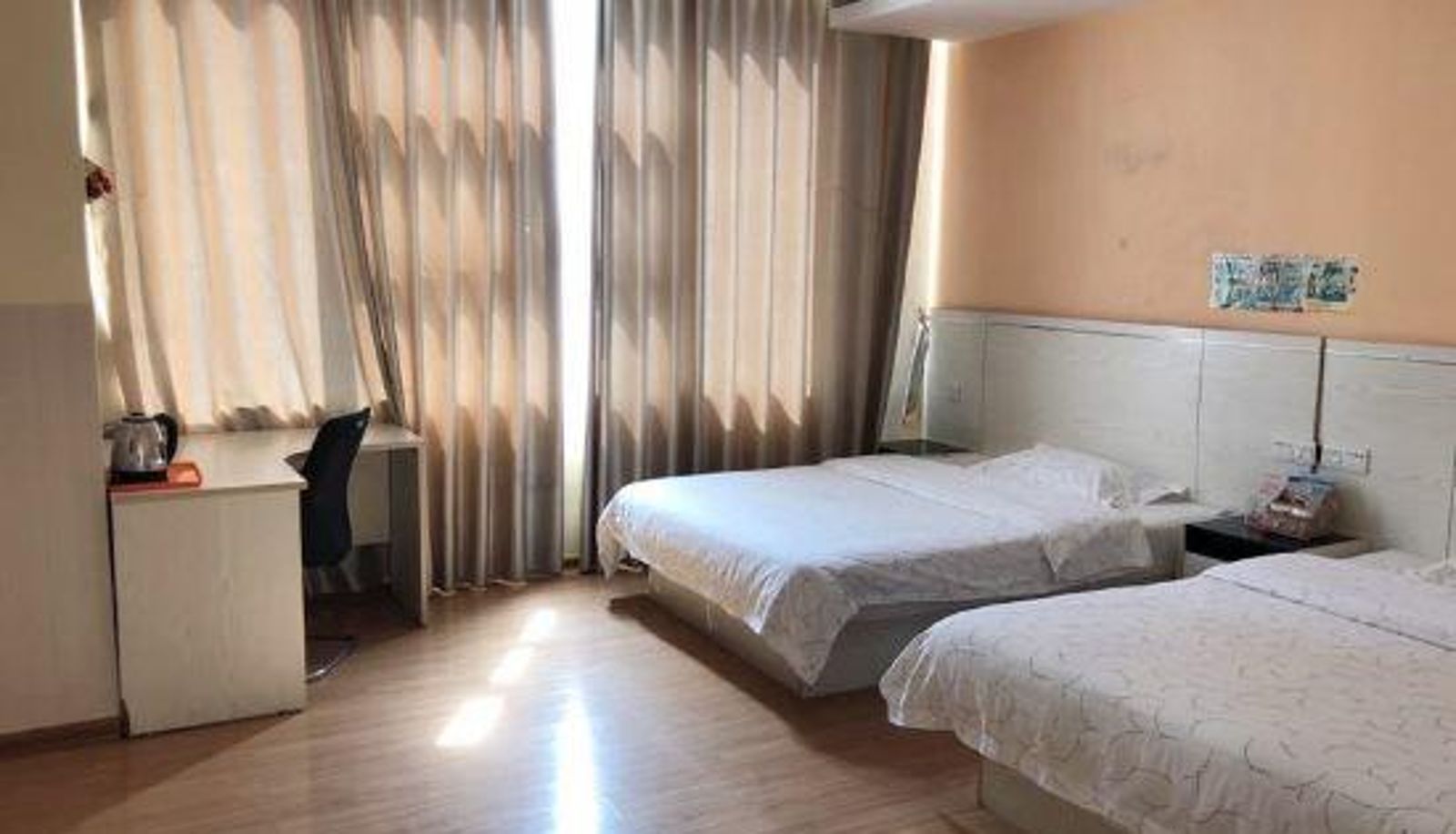 Zimmer - Home Convenient Hotel (Debao Xinlong Branch)