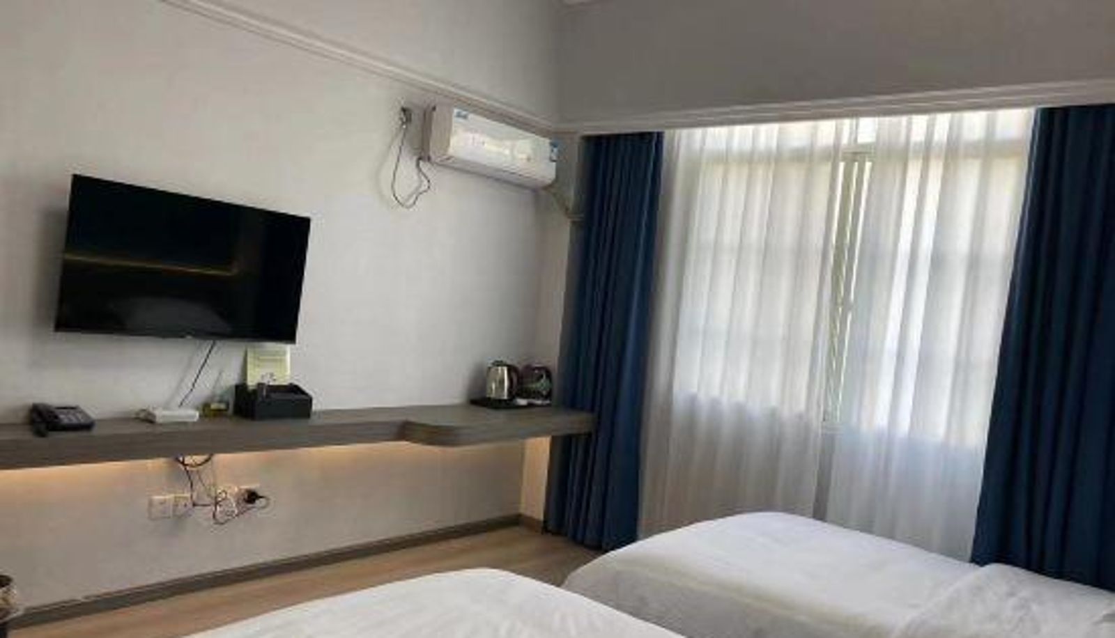 Familienzimmer - Huali Hotel Mangshi