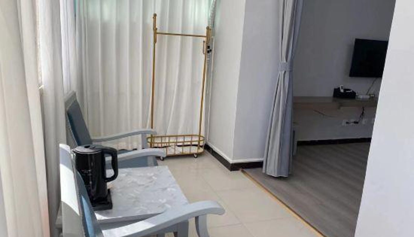 Zimmer mit Balkon - Huali Hotel Mangshi