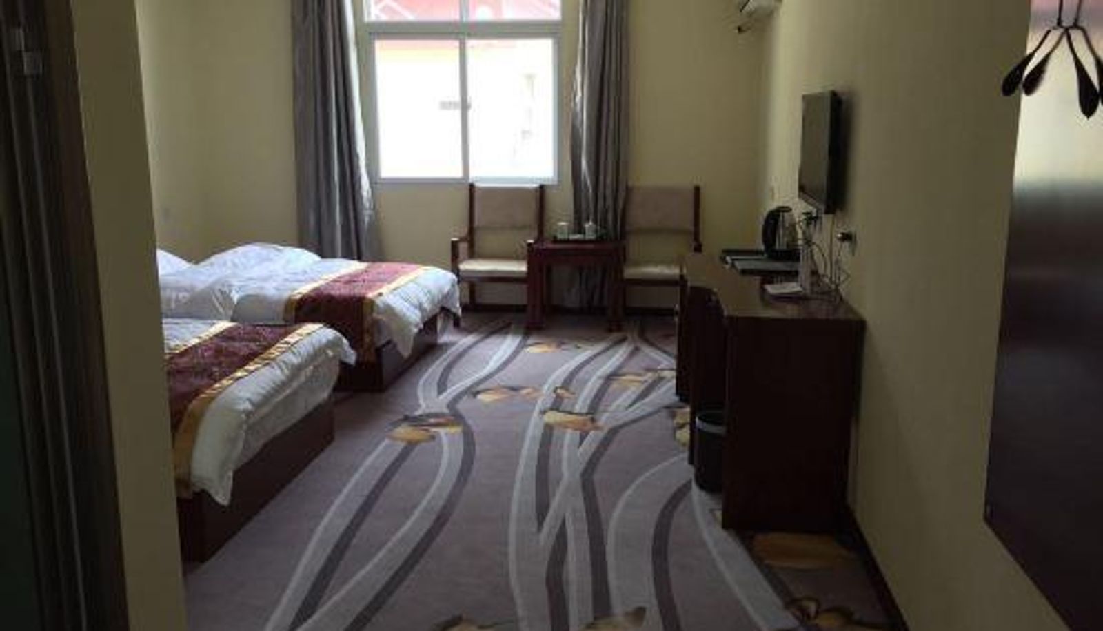 Zimmer - Xianggelila Half moon bay Theme Hotel