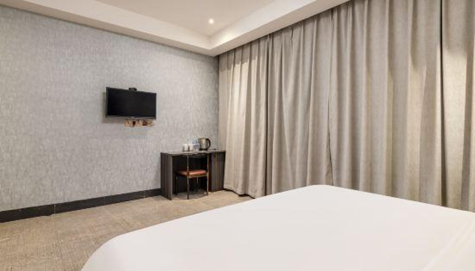 Zimmer - Dolphin Bay Hotel (Liupanshui Government People's Hospital)