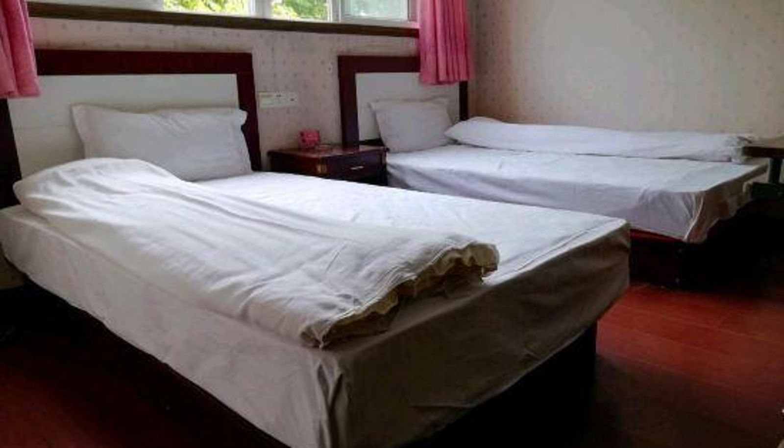 Zimmer - Taizhou Jinsenianhua Hostel