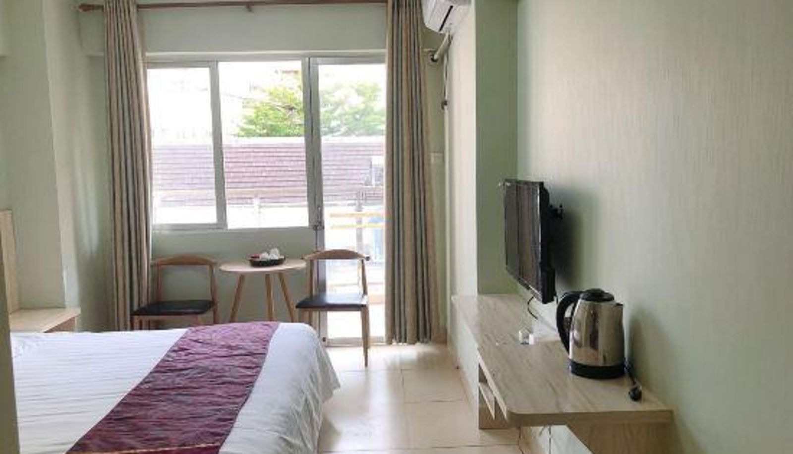 Zimmer - Xinjie Apartment Hotel